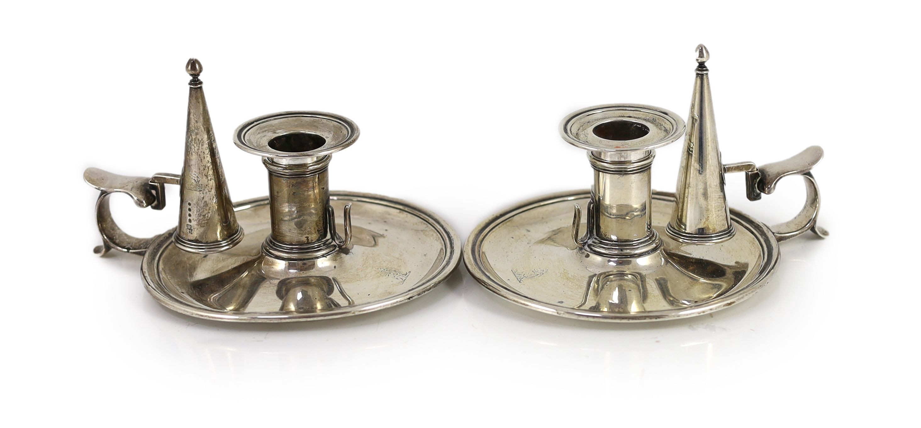 A pair of early Victorian silver circular chambersticks, by R & S Garrard & Co